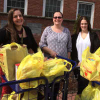 <p>Liz Twiggs, Laura Sabatello and Melissa Traverso with food donations in Fair Lawn.</p>