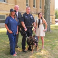 <p>New Rochelle residents Jennifer Ubl and Jessica Levine with Police Commissioner Patrick Carroll and K9 Officer Matthew Glass.</p>