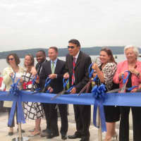 <p>Officials cut the ribbon at Harbor Square in Ossining.</p>