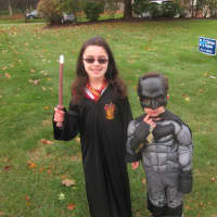 <p>Ginny Weasley and Batman march in the Briarcliff Ragamuffin Parade.</p>