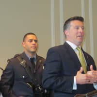 <p>Rye Police Commissioner Michael C. Corcoran Jr. flanked by Rye&#x27;s newest patrol officers from left to right, Alexander F. Whalen and Chad Delgado. (Rye firefighter Ryan M. Iarocci is at far right.)</p>