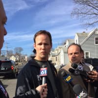 <p>Bridgeport Police Capt. Brian Fitzgerald, next to Mayor Joe Ganim, speaks to the media Friday at the scene of an overnight homicide and child abduction.</p>