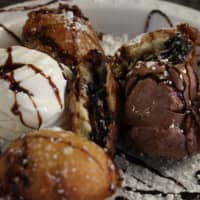 <p>Occasionally Chrisomalis branches out from the usual menu items, such as these deep fried Oreos with ice cream.</p>
