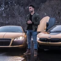 <p>Edgewater&#x27;s Coby Persin and two of his chrome supercars.</p>