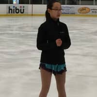 <p>A member of the Laurel Ridge Skating Club listens to judges&#x27; comments after her skating test at The Rinks of Shelton.</p>