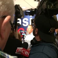 <p>The press crowds around John Kasich after the GOP presidential hopeful leaves a Town Hall Meeting in Fairfield.</p>