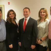 <p>Westchester County Executive Rob Astorino with the owners of a newly reopened T&amp;J Restaurant and Pizzeria in Port Chester. Flanking Astorino, from left to right, are Ray and Gina Sassano and Veronica and John Ruggiero.</p>