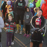 <p>Young runners and their buddies line up at the starting line at Continental Soldier Field in Mahwah.</p>