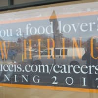 <p>A banner in a storefront window of the former D&#x27;Agostino&#x27;s supermarket announces job contact information for the new Balducci&#x27;s, set to open in 2017.</p>