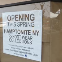 <p>Another storefront sign at Rye Ridge Shopping Center declares the expected 2017 opening of Hamptonite NY Resort Wear Clothing.</p>