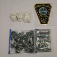 <p>Police said they seized more than 300 grams of cocaine and marijuana in the home of two Norwalk men</p>