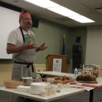 <p>Richard Herzfeld explains his popular business, Chef&#x27;s Table, at Fairfield Public Library.</p>