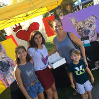 <p>Mia and Hope Buzzelli with Lisa Adamak and her son, Nate</p>