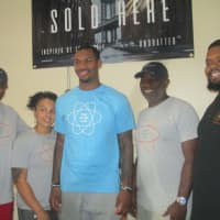 <p>Sean Kilpatrick at The Juice Lab with his father Sean Kilpatrick, Sr and Sean Brooks to the right of him.</p>
