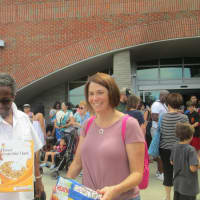 <p>Eliza Dean and Melissa Frey with their cereal boxes to view the eclipse.</p>