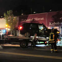 <p>The vehicle was removed by flatbed tow truck.</p>