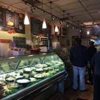 <p>Customers line up at Lenny&#x27;s Bagels.</p>
