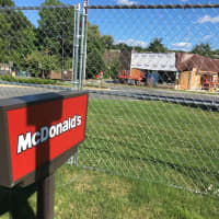<p>The McDonald&#x27;s on Lake Avenue Extension in Danbury is closed for renovations. A large fence surrounds the entire property.</p>