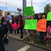 <p>Protesters gather outside a Donald Trump rally at the Klein Memorial Auditorium in Bridgeport on Saturday.</p>