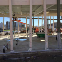 <p>Crews worked on the future Brownstein-Selkowitz Carousel Pavilion in Mill River Park Tuesday.</p>