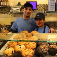 <p>Workers Kais and Maria at Manhattan Bagel in Englewood.</p>
