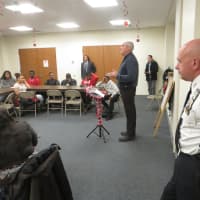 <p>Jim Isenberg, executive director of the North American Family Institute in New York, speaks to a group of Port Chester teenagers. Port Chester Police Chief Richard Conway, at right, also spoke to the high school students on Friday.</p>