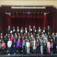 <p>Assemblyman David Buchwald, local veterans and students during the Valentines for Veterans assembly at S.J. Preston Elementary School in West Harrison on Feb 10.</p>