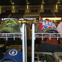 <p>Caps on sale at Sunday&#x27;s gun show included one labeled &quot;Rebel&quot; with a Confederate flag design.</p>