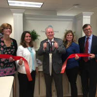 <p>Fairfield First Selectman Michael Tetreau does the honors at the ribbon-cutting for Coastal Connecticut Counseling.</p>