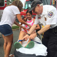 <p>Sandy Onorato and a Paramus EMT strap Chelsea, 17, onto a stretcher. Don&#x27;t worry, it was just for the photo-op.</p>