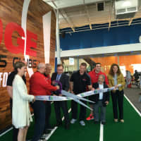 <p>Local dignitaries help Fitness Edge staffer celebrate their new location in Stratford.</p>