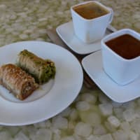 <p>Armenian style coffee is thick and grainy, typically served piping hot in a small cup. Arenie also offers a variety of pastries that use pistachios or walnuts as the centerpiece.</p>