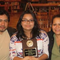 <p>Karen Pantoja celebrates with her proud parents after Wednesday&#x27;s 13th annual Phillis Wheatley Poetry Slam at Port Chester High School.</p>