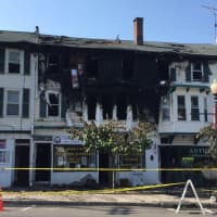 <p>The landmark building on Greenwood Avenue in Bethel is heavily damaged after a fire early Thursday.</p>