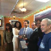 <p>Saudi Prince Turki M al Saud, third from left, receives the key to the city from Bridgeport Mayor Joe Ganim, third from right. Star of Istanbul Restaurant owner Helim Yildiz, right, looks on.</p>