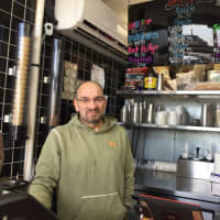 <p>Mike Elias prepares to reopen Ice Cream By Mike in Hackensack.</p>