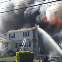 <p>A neighboring house was damaged, as well.</p>