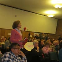 <p>Area residents lined up to ask Westchester County Executive Rob Astorino questions at a town hall meeting in Port Chester on Wednesday. One resident asked about the poor condition of roads in Rye and Harrison.</p>