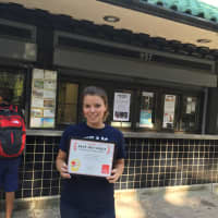 <p>Katherine Warrington Woodward of Walter&#x27;s Hot Dogs with the DVlicious certificate.</p>