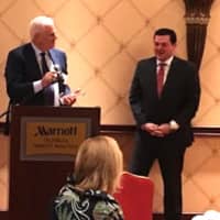 <p>Robert Scinto, a corporate real estate developer, receives the Corporate Success Award from First Selectman Tim Herbst at the breakfast.</p>