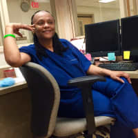 <p>Moore sits at the desk in the surgical unit at Holy Name — exactly where she was in August 2008 when she received a call that she had a match.</p>