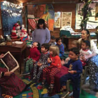 <p>Country Childrens Center Executive Director Polly Peace read &quot;The Polar Express&quot; to the attendees.</p>