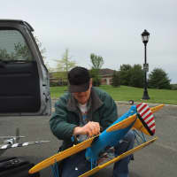 <p>Steve Edkins prepares a model plane for flight at Redding&#x27;s Meadow Ridge Tuesday.</p>