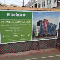 <p>Officials held a groundbreaking ceremony Tuesday for Metro Green III, a new high-rise apartment building under construction near the train station in Stamford.</p>