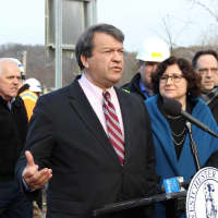 <p>County Executive George Latimer speaks Tuesday at a news conference at the Ashford Avenue Bridge, where the northbound ramp reopened to the Saw Mill Parkway. Legislator MaryJane Shimsky, who represents Ardsley and Dobbs Ferry, is next to Latimer.</p>
