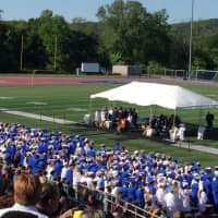 <p>The Class of 2016 at Danbury High School takes the field Thursday night for graduation under clear blue skies.</p>