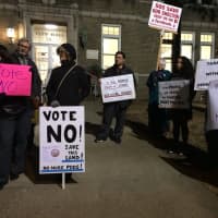 <p>Protesters from Save Our Shelton line up outside Shelton City Hall on Thursday evening to urge a &quot;no&quot; vote on the proposed development, Towne Center at Shelton Ridge.</p>