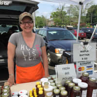 <p>Dawn Longton of Lebanon&#x27;s Sugar Maple Farms offers fresh honey and maple syrup at the Greenwich Farmers Market on Saturday.</p>