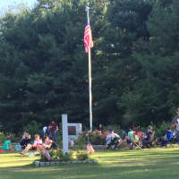 <p>Pokemon Go players gather at the World War II Rose Arbor in Rogers Park in Danbury.</p>