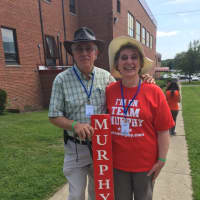 <p>Geoff and Maureen Bartlett of Ridgefield pose with the Murphy sign from the 2012 Democratic State Convention. Maureen is waring her Team Murphy T-shirt — but she changed the &quot;12&quot; on the back to &quot;18&quot; in anticipation of his re-election campaign.</p>